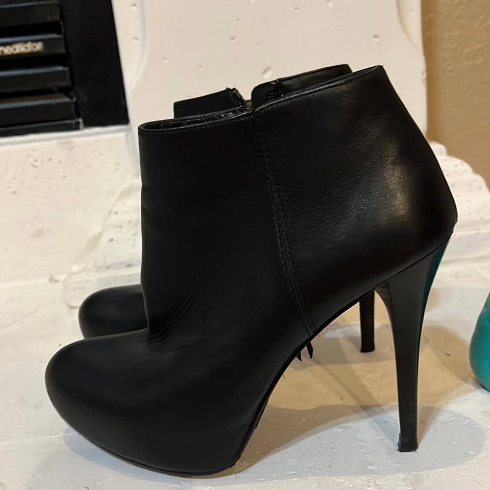 Stuart Weitzman ladies leather spike ankle boots. Excellent condition.